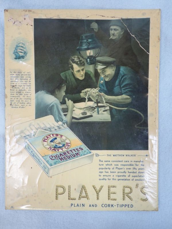 A 'PLAYER'S PLAIN AND CORK TIPPED' ADVERTISING CARD