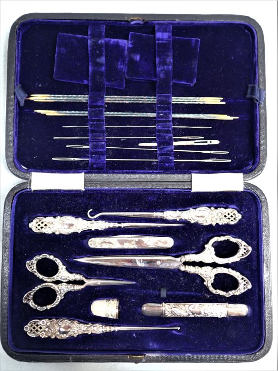 A VICTORIAN SILVER SEWING SET