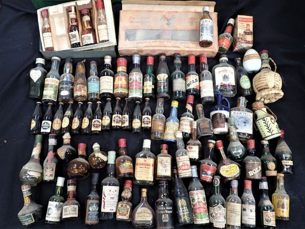 A COLLECTION OF ALCOHOLIC MINIATURES