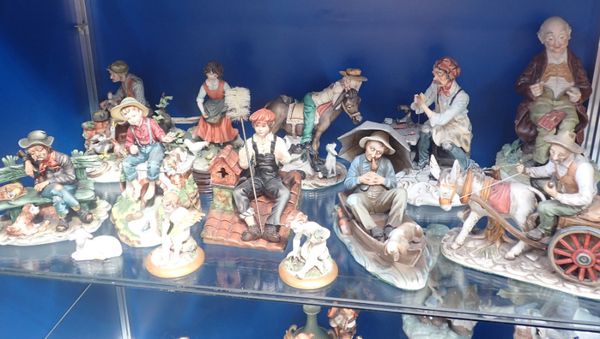 A COLLECTION OF CAPODIMONTE FIGURES