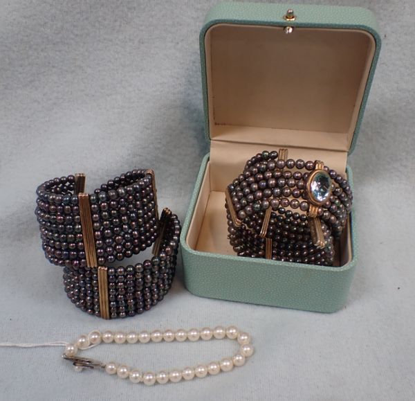 TWO MODERN PEARL BANGLES AND PEARL BRACELET