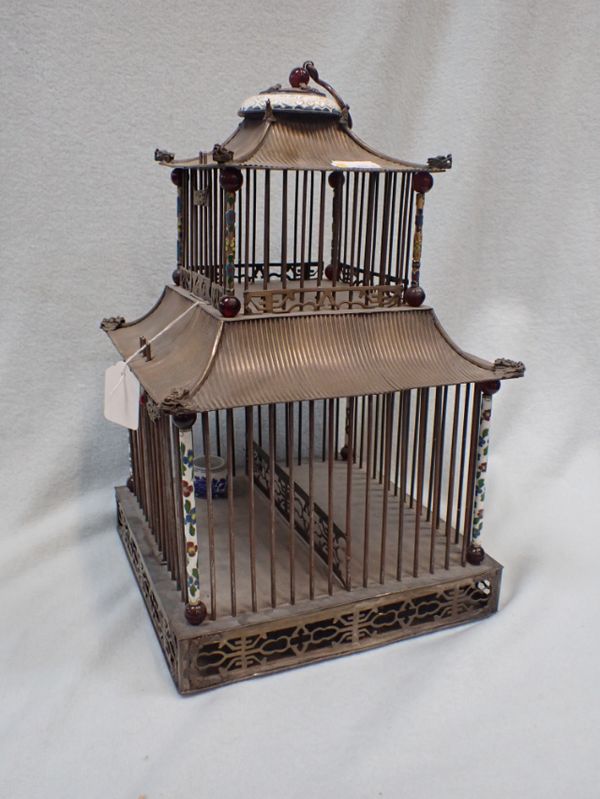 A PAGODA SHAPED BIRDCAGE