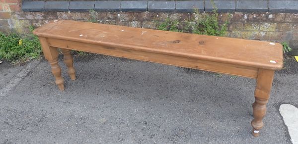A VICTORIAN STYLE PINE BENCH