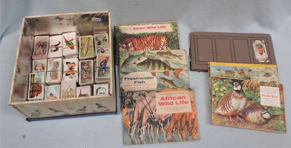 A COLLECTION OF CIGARETTE CARDS