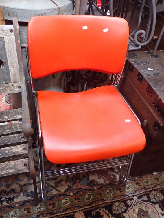A SET OF FOUR METAL MODERNIST CHAIRS
