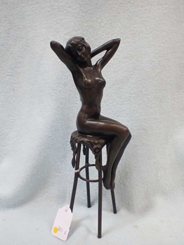 AFTER DEMETRE CHIPARUS: NUDE WOMAN SITTING ON A HIGH STOOL, BRONZE