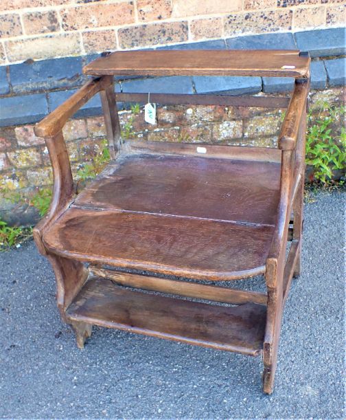 A GEORGE III OAK LIBRARY OR BED STEP CHAIR