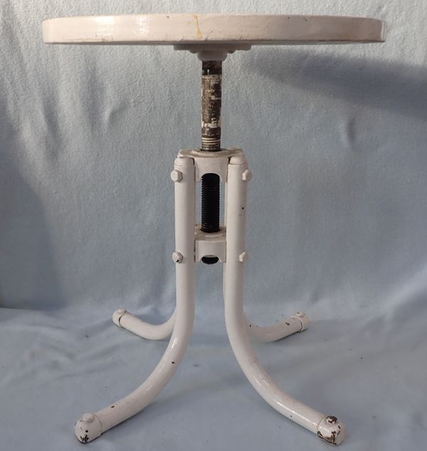 AN INDUSTRIAL STYLE TUBULAR STEEL ADJUTABLE TABLE OR STAND