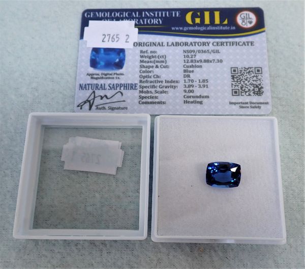 A SINGLE CUSHION-CUT SAPPHIRE