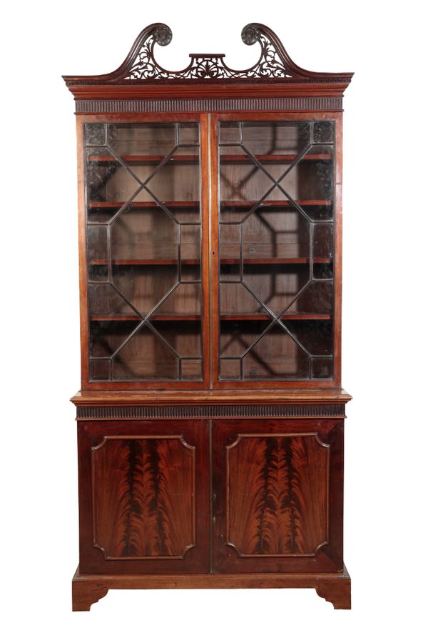 A GEORGE III STYLE MAHOGANY BOOKCASE