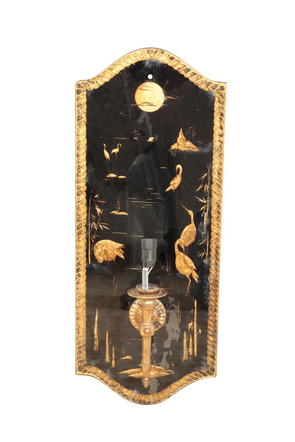 A BLACK LACQUERED AND PARCEL-GILT WALL APPLIQUE