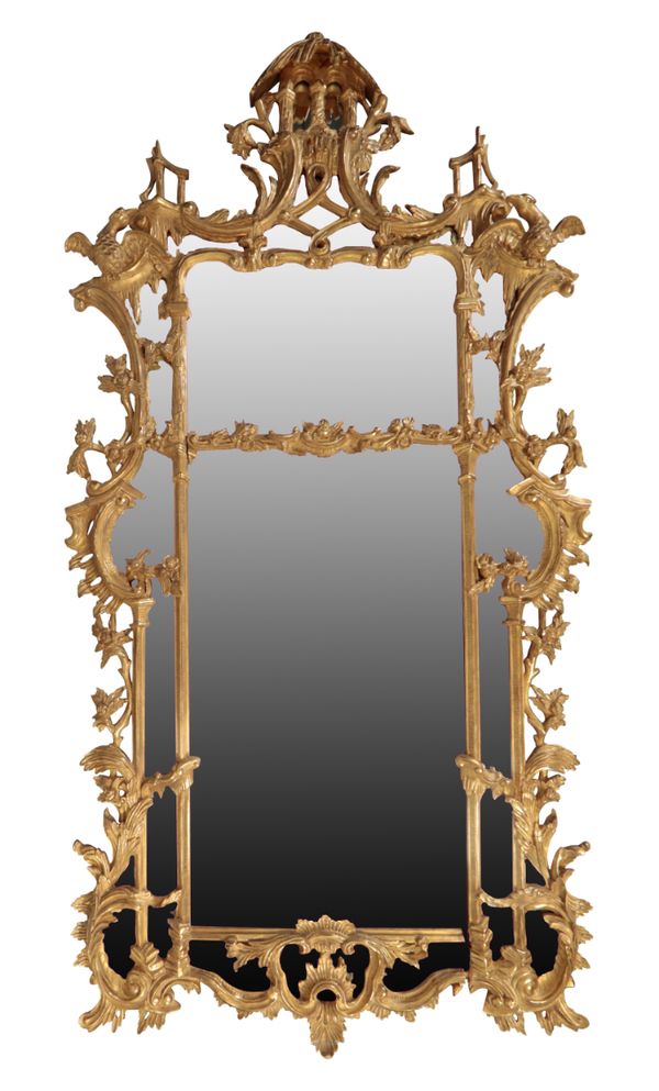 A LARGE GILTWOOD WALL MIRROR IN THE MANNER OF THOMAS CHIPPENDALE