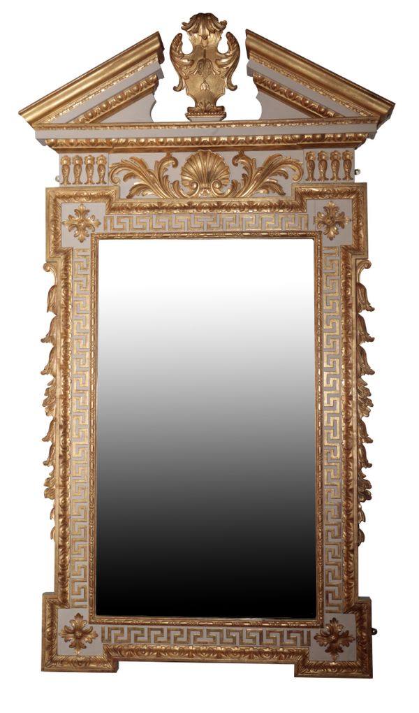 A WHITE-PAINTED AND PARCEL-GILT MIRROR IN THE MANNER OF WILLIAM KENT