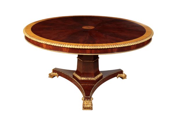 A MAHOGANY AND SATINWOOD CROSSBANDED REGENCY STYLE CENTRE TABLE