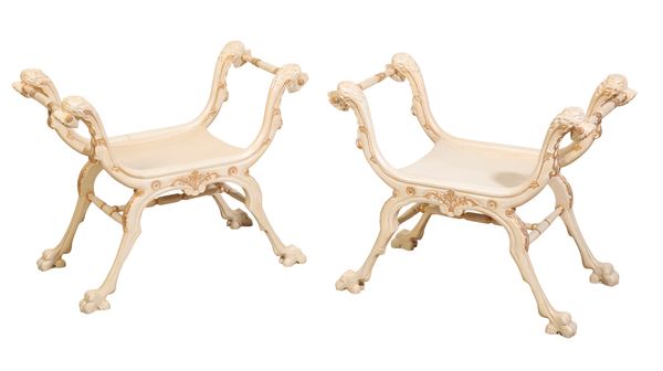 A PAIR OF REGENCY STYLE WHITE-PAINTED AND PARCEL-GILT STOOLS