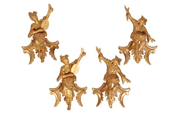 A GROUP OF FOUR GILTWOOD FIGURAL WALL MOUNTS