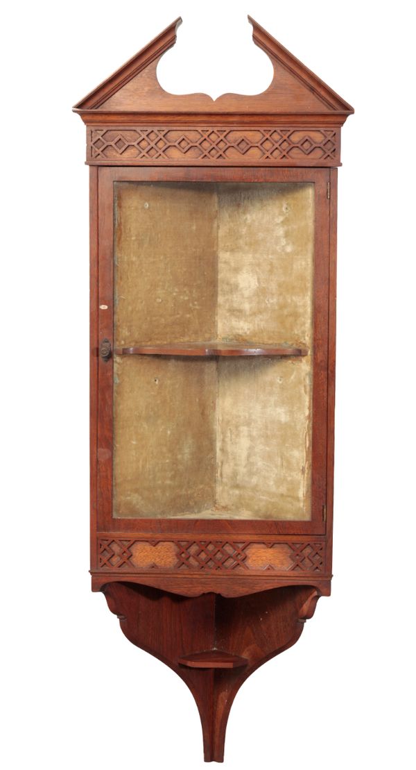 A GEORGE III STYLE HANGING CORNER CUPBOARD