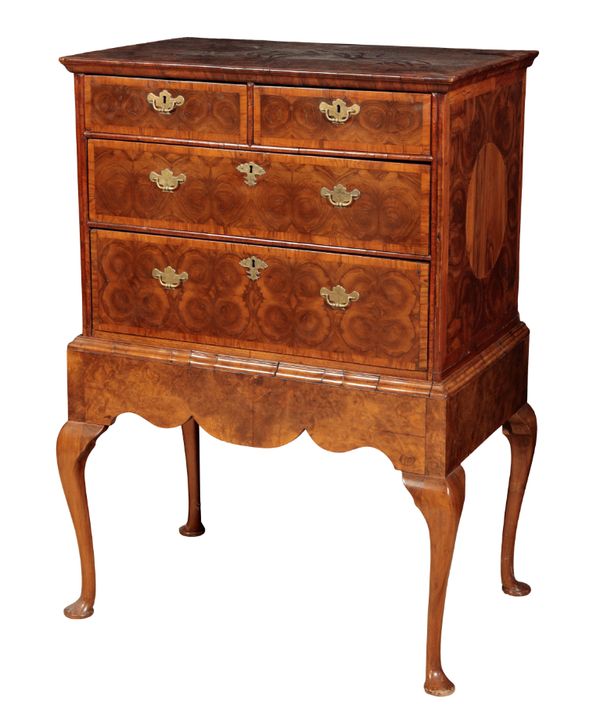 A WILLIAM AND MARY OYSTER-VENEERED WALNUT CHEST OF DRAWERS