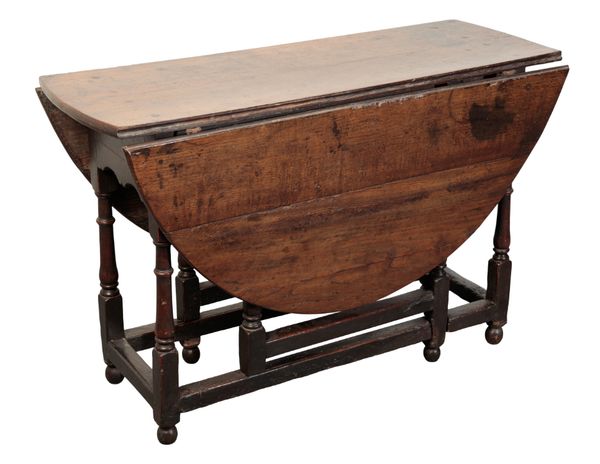 A 17TH CENTURY OAK GATELEG TABLE