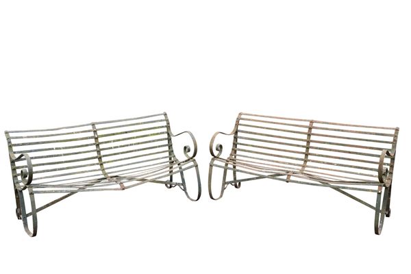 A PAIR OF WROUGHT IRON GARDEN BENCHES