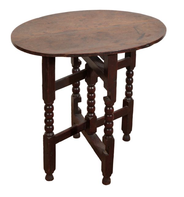 A LATE 17TH CENTURY OAK FOLDING TABLE