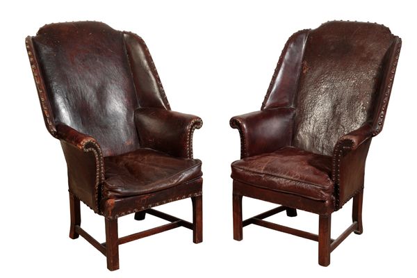 A PAIR OF GEORGE III MAHOGANY WING ARMCHAIRS