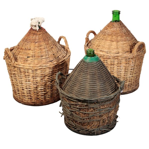 THREE CARBOYS IN BASKETS