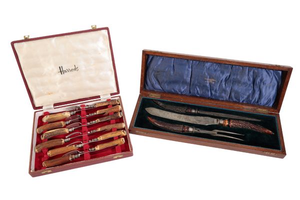 A CASED SILVER BANDED THREE PIECE CARVING SET BY WALKER & HALL