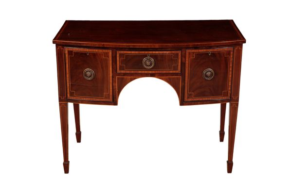 A MAHOGANY AND CROSSBANDED SIDEBOARD IN SHERATON TASTE