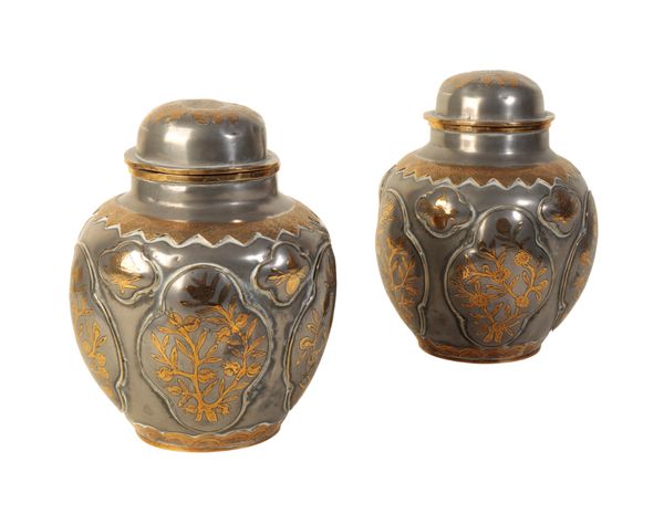 A PAIR OF LATE 19TH CENTURY METAL VASE AND COVER