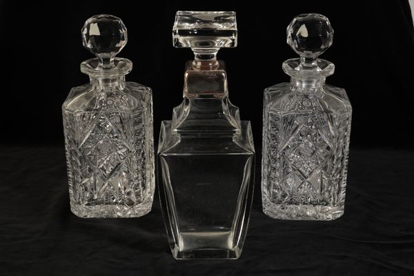 A PAIR OF CUT GLASS DECANTERS