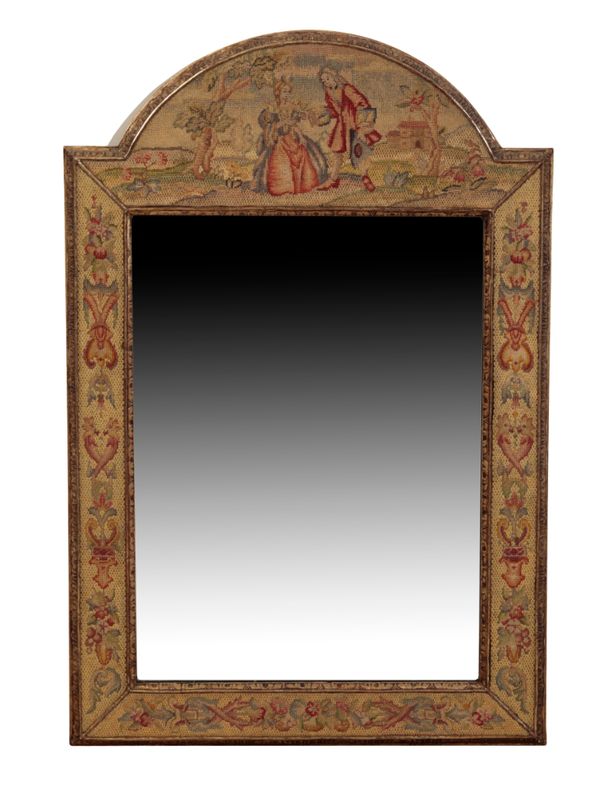 A PARCEL-GILT AND WOOLWORK FRAMED WALL MIRROR
