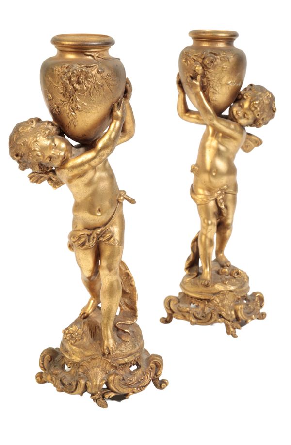 A PAIR OF 19TH CENTURY GILT METAL FIGURAL CANDLESTICKS IN THE MANNER OF AUGUSTE MOREAU