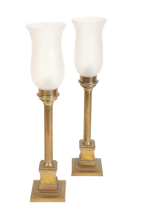 A PAIR OF BRASS COLUMNAR CANDLESTICK LAMPS