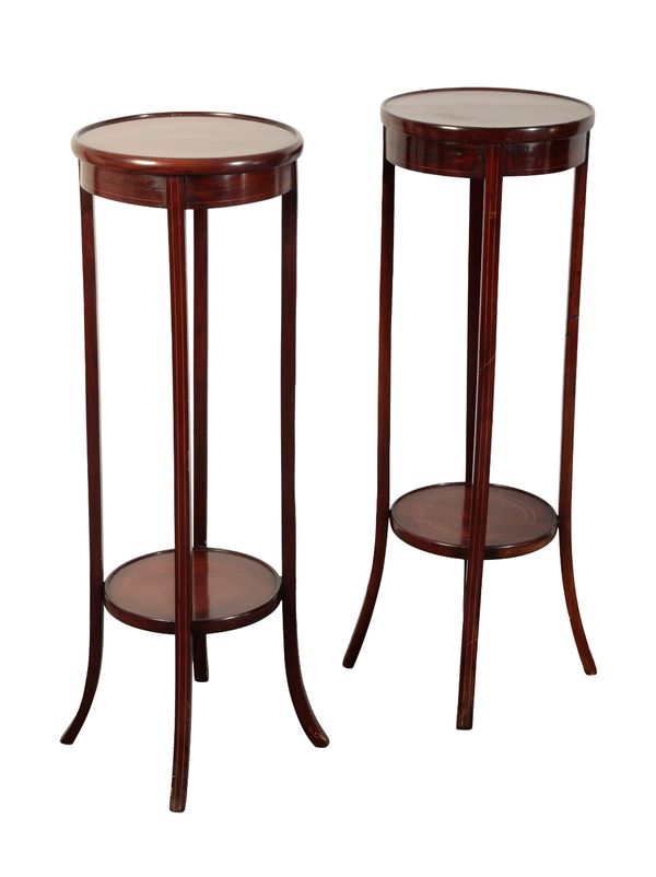 A PAIR OF EDWARDIAN MAHOGANY PLANT STANDS