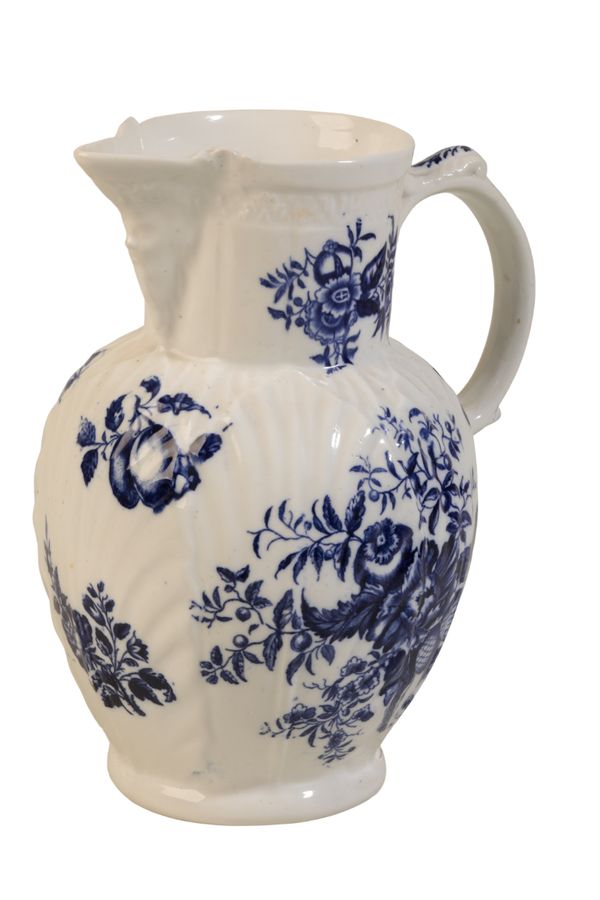 A BLUE AND WHITE MASK JUG,