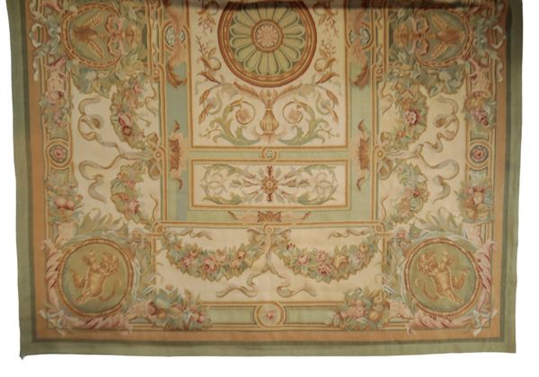 AN AUBUSSON STYLE PALE GROUND RUG