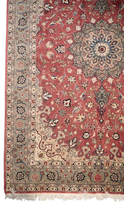 A PERSIAN TABRIZ STYLE RUG