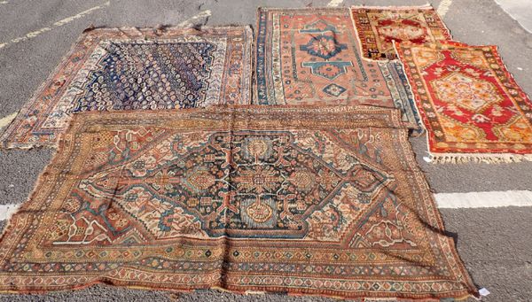 FIVE ASSORTED ORIENTAL RUGS