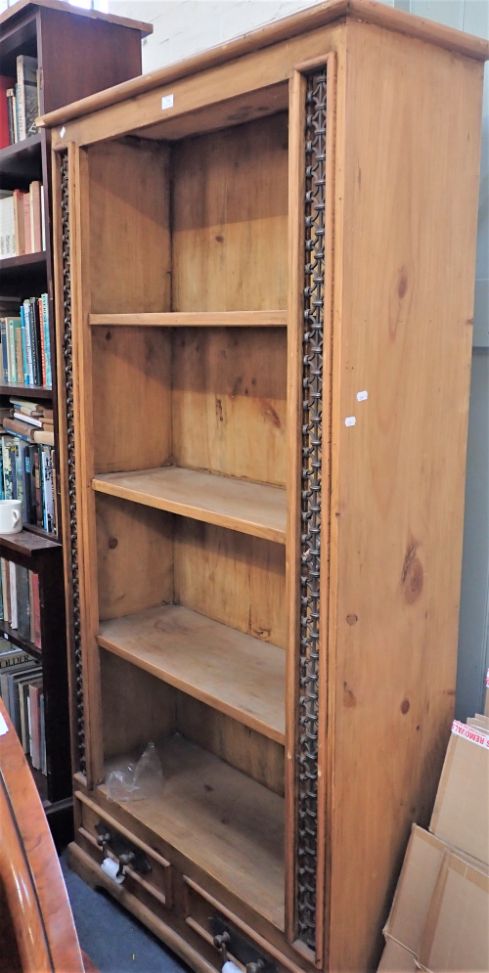 A PINE OPEN BOOKCASE