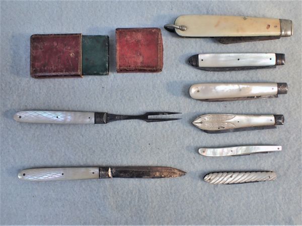 A 19TH CENTURY SILVER AND MOTHER-OF-PEARL FOLDING 'CAMPAIGN' KNIFE AND FORK