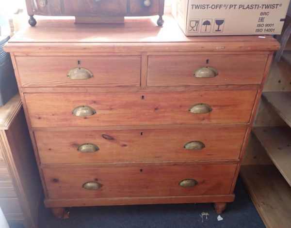 A LATE 19TH CENTURY STAINED PINE CHEST OF DRAWERS