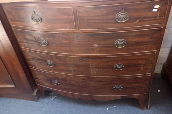 A GEORGE III MAHOGANY BOW FRONT CHEST OF DRAWERS