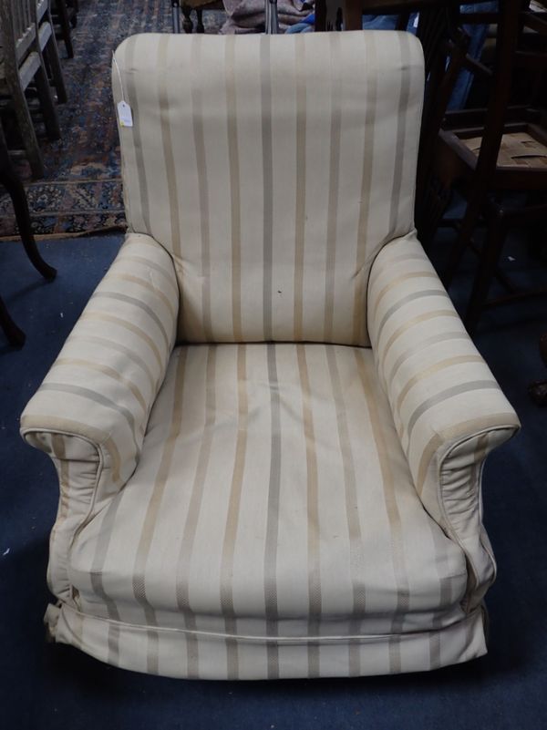 A LATE VICTORIAN UPHOLSTERED EASY CHAIR