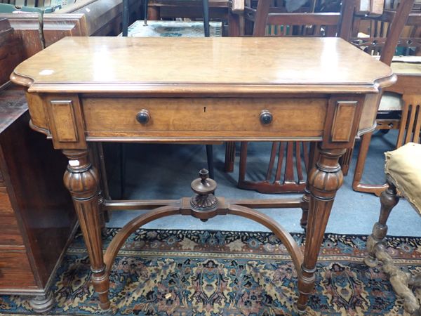 A VICTORIAN WALNUT WRITING TABLE, IN THE FRENCH TASTE