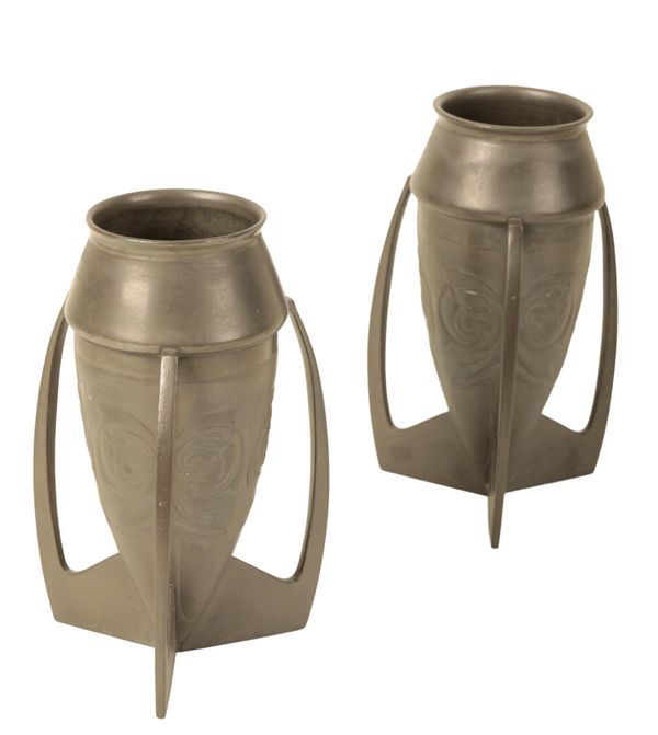 A PAIR OF PAIR OF EMBOSSED PEWTER 'BOMB' VASES