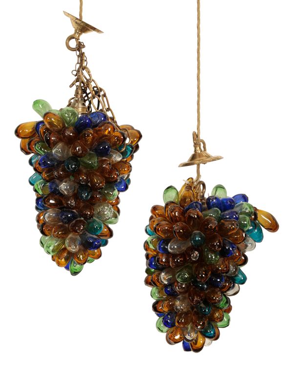 A PAIR OF COLOURED GLASS PENDANT LIGHTS IN THE FORM OF BUNCHES OF GRAPES
