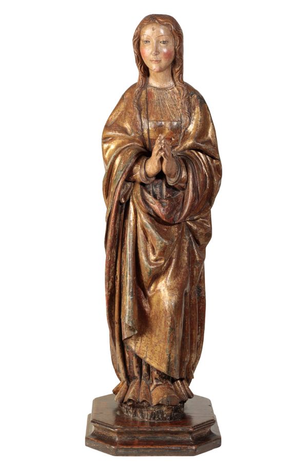 A FINE GOTHIC POLYCHROMED WALNUT FIGURE OF THE PRAYING VIRGIN