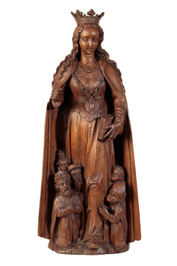 A FLEMISH CARVED OAK FIGURE OF A SAINT, POSSIBLY ST URSULA