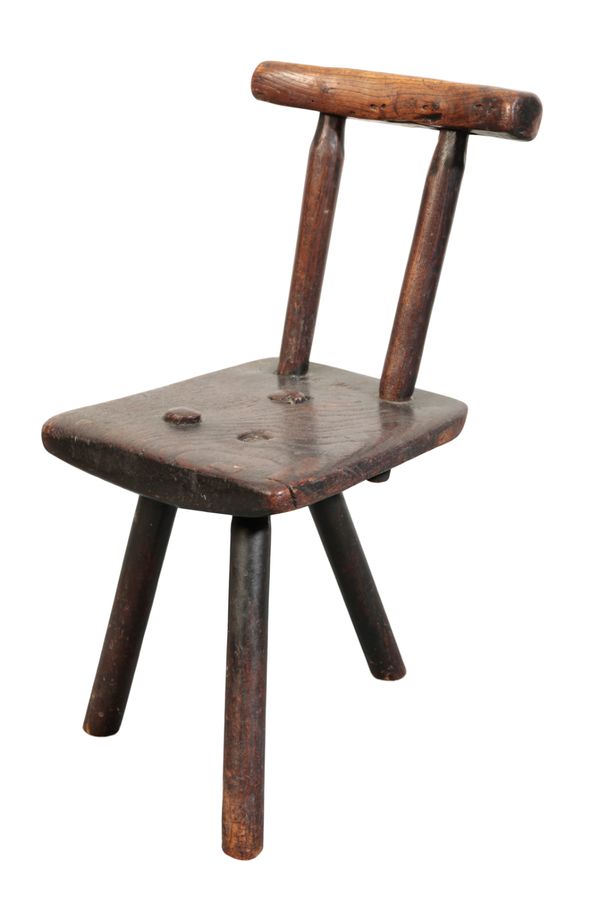 A PRIMITIVE OAK CHILD'S CHAIR